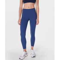 Women's mid rise compressive gym leggings with side pockets