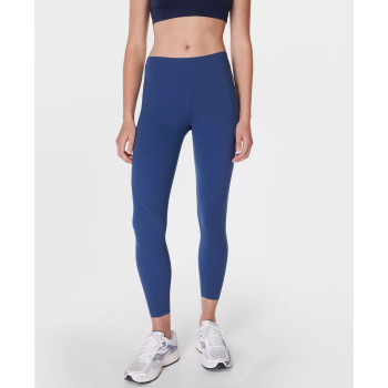 Women's mid rise compressive gym leggings with side pockets