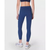 Women's mid rise compressive gym leggings with side pockets