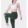 Women's mid rise compressive gym leggings with side pockets