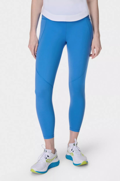 Women's mid rise compressive gym leggings with side pockets