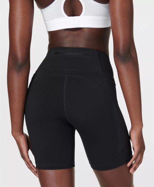 High waist running shorts with side pockets supportive mid length biker shorts