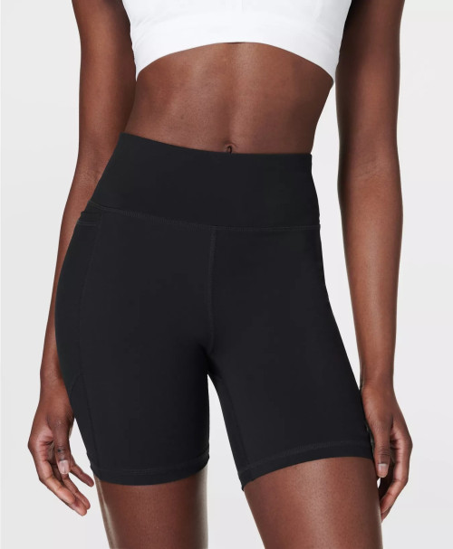 High waist running shorts with side pockets supportive mid length biker shorts