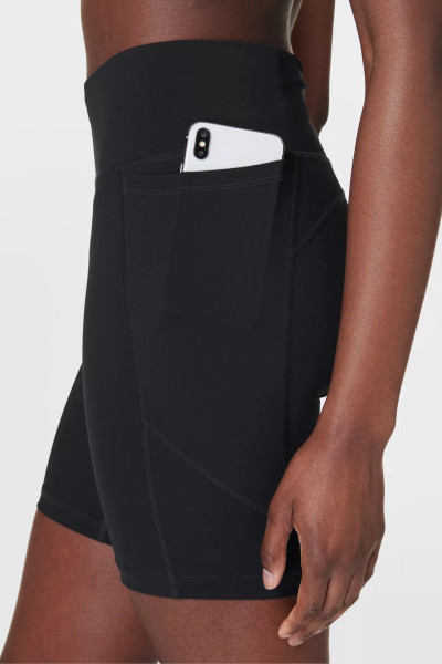 High waist running shorts with side pockets supportive mid length biker shorts