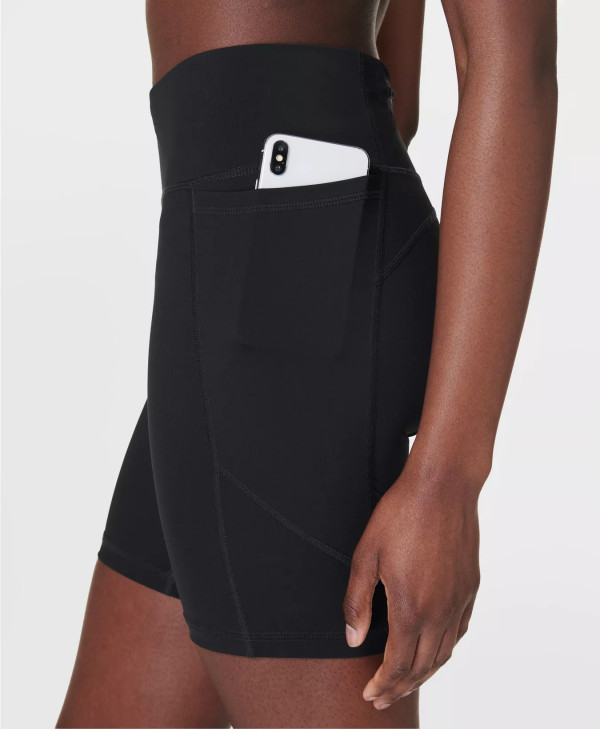 High waist running shorts with side pockets supportive mid length biker shorts