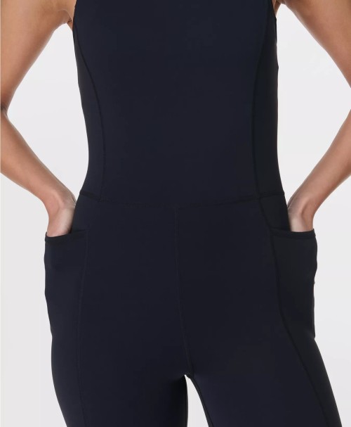 Scoop neck wide strap padded jumpsuits hollow back short bodysuits with side pockets