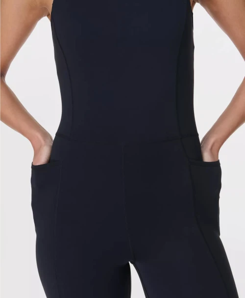 Scoop neck wide strap padded jumpsuits hollow back short bodysuits with side pockets