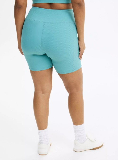 Women's plus size tummy control ribbed biker shorts with side pockets