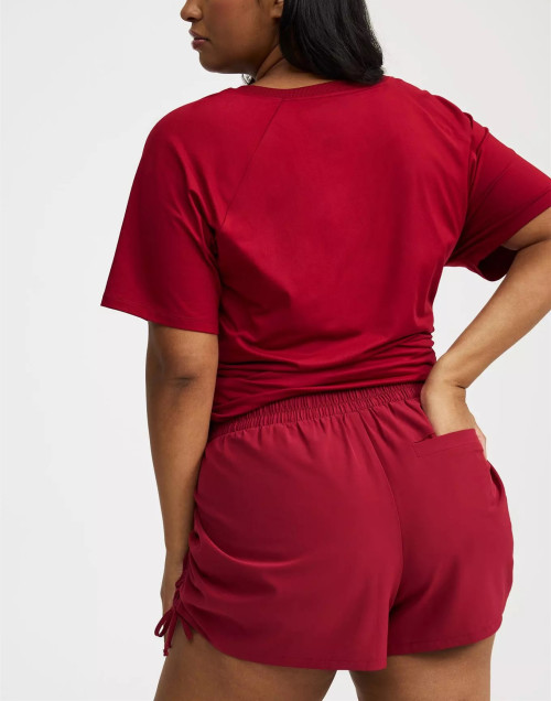 Elastic wasit side cinched running shorts with welt pockets