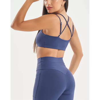 Women's medium impact strappy back sports bra with removable paddings