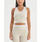 Crew neck color block racerback crop top with removable padding