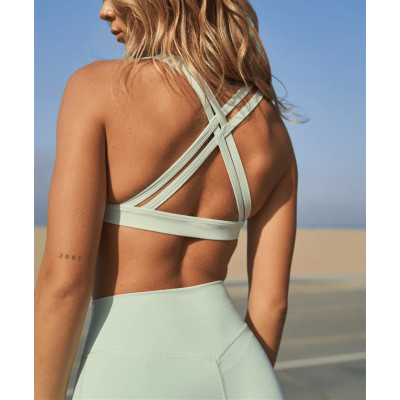 Women's strappy back medium support sports bra with removable paddings