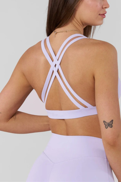 Women's strappy back medium support sports bra with removable paddings