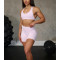 Women's strappy back medium support sports bra with removable paddings