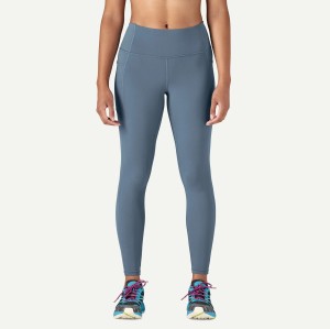 Women's form fitting 7/8 length fitness tights with side pockets