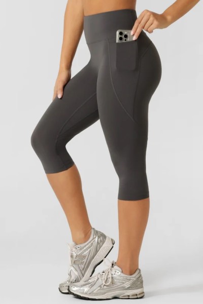 Tummy control compressive capris with side pockets flattering butt lifting fitness tights