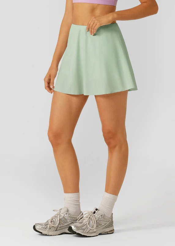 Women's lightweight flowy active skorts versatile athleisure tennis skirts with built in shorts
