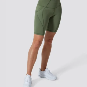 Wholesale private label yoga shorts with side pockets butt lifting gym shorts
