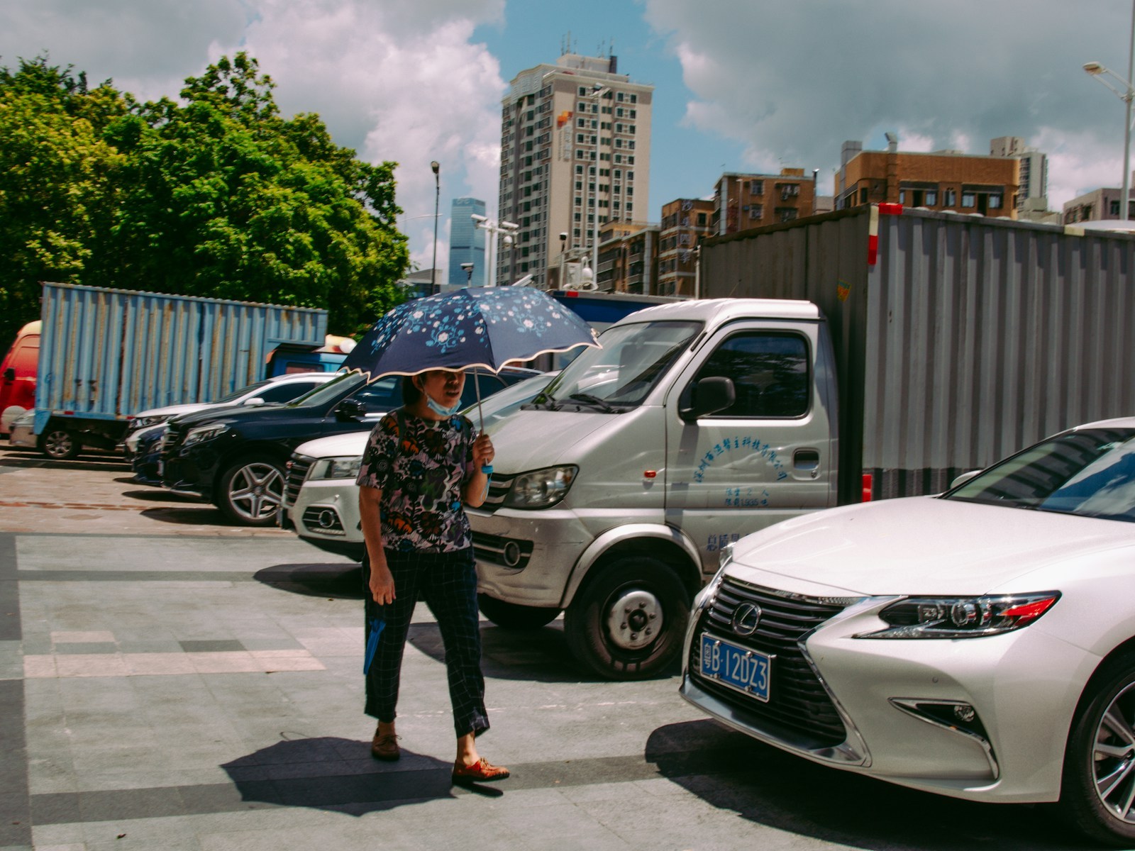 Buyer inspecting a used car before purchase