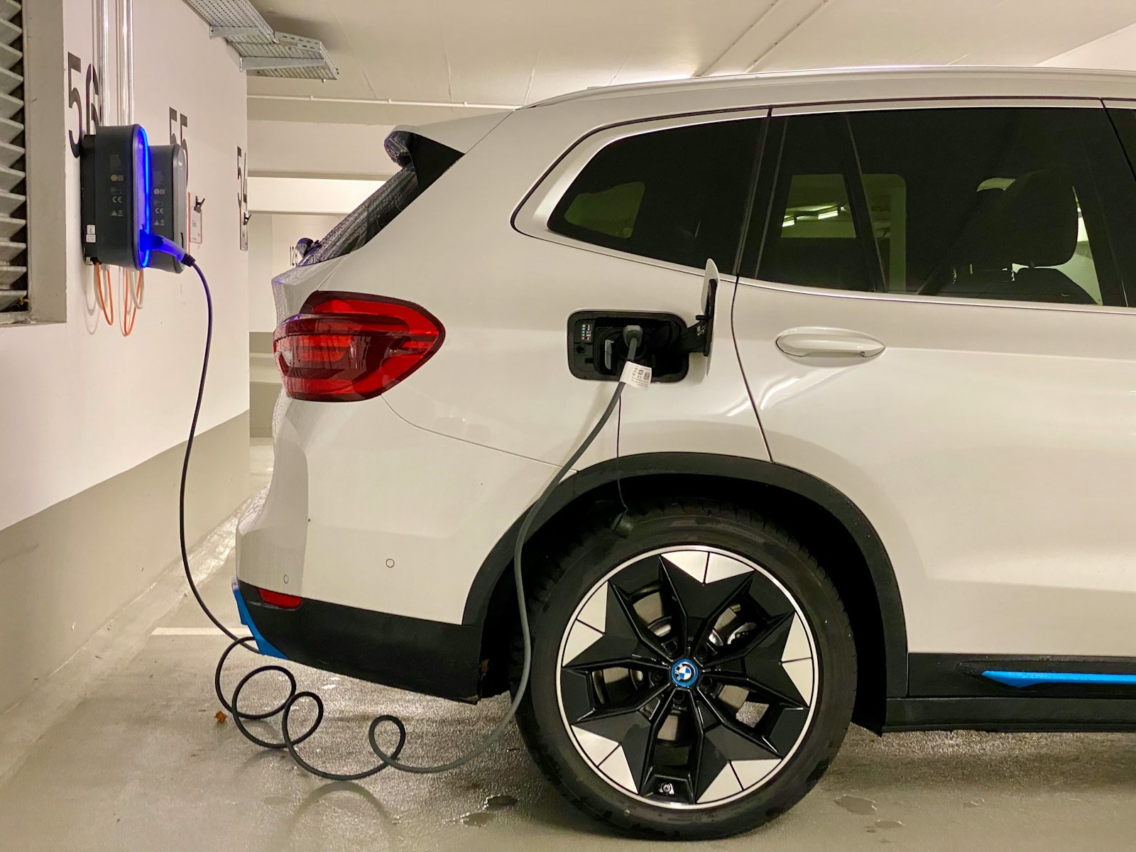 Electric vehicle at a charging station