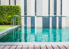 Swimming pool deck with thick anti-slip porcelain tiles