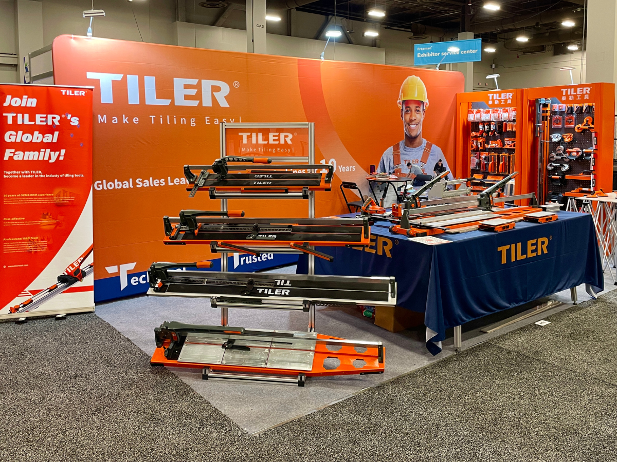 TILER booth showing tile cutting machines