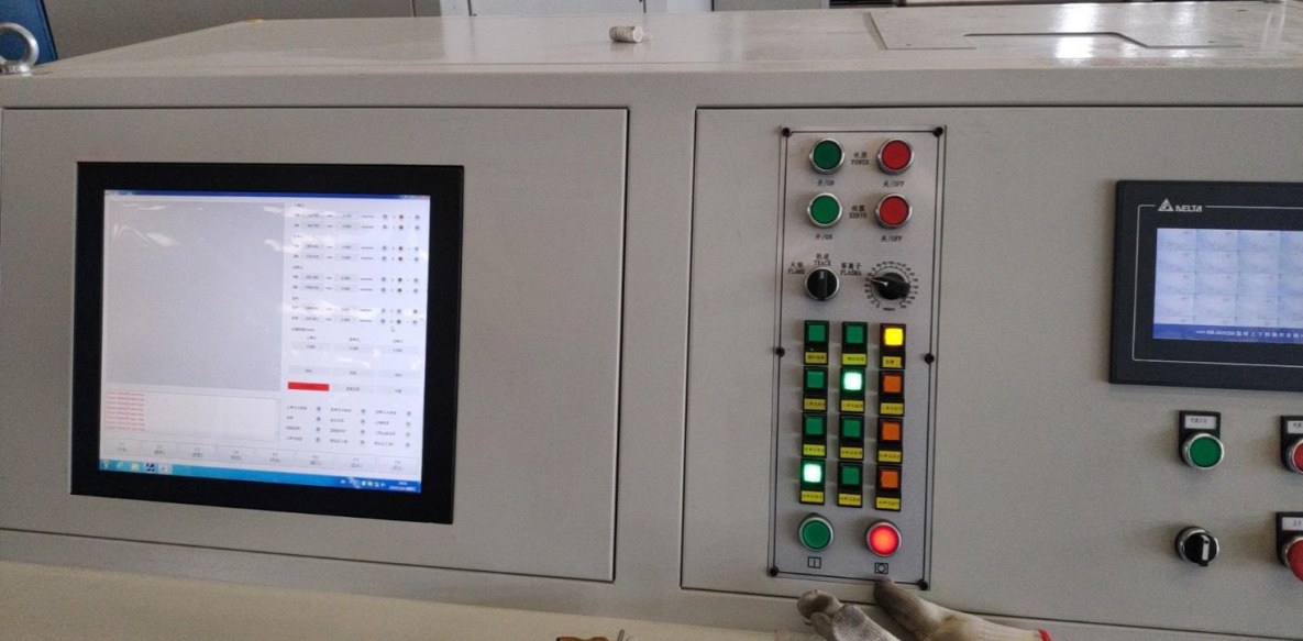 YOMI 3D drilling machine control console with HMI and push buttons