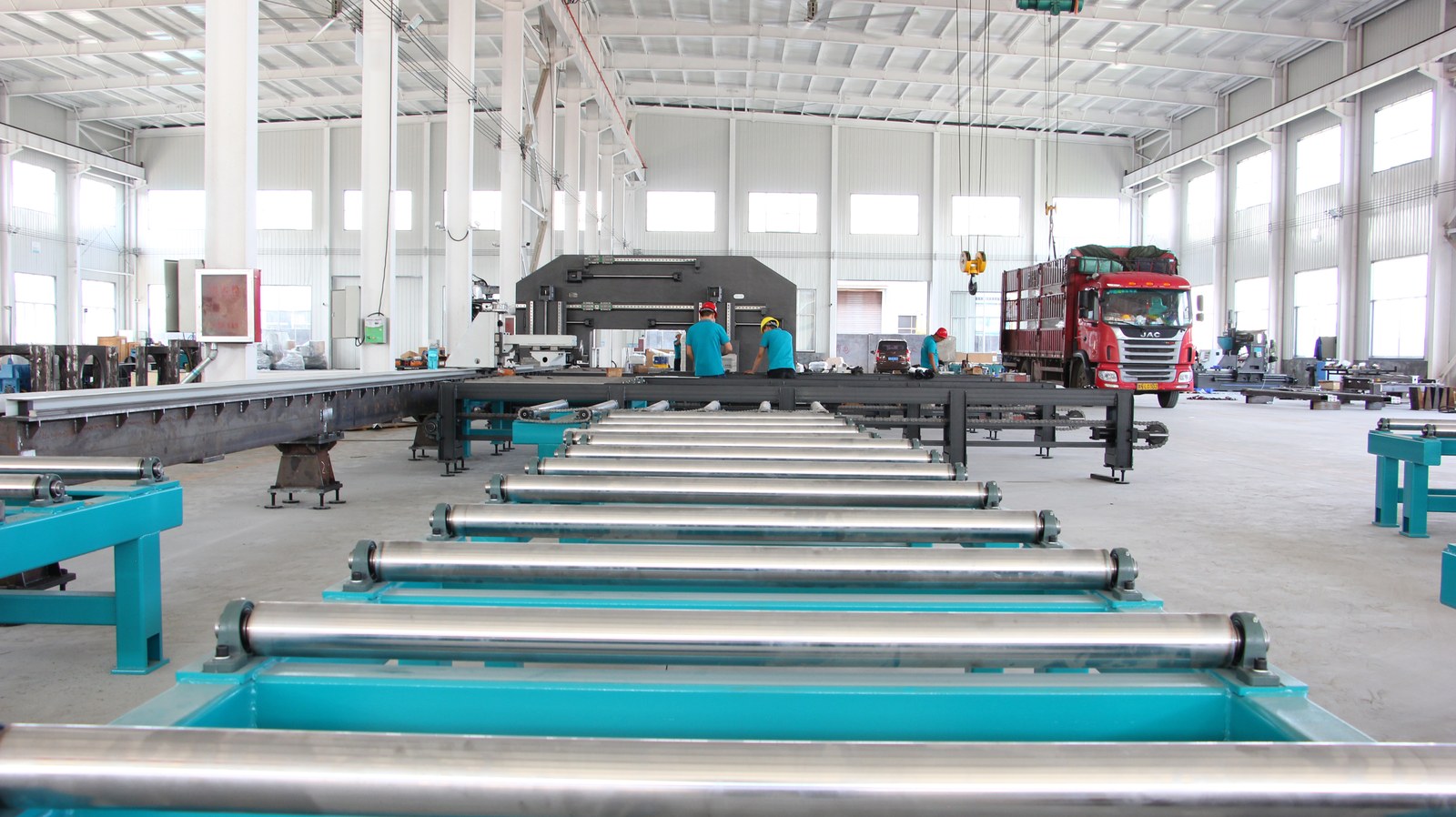 YOMI 3D beam drilling line installed in a steel structure workshop