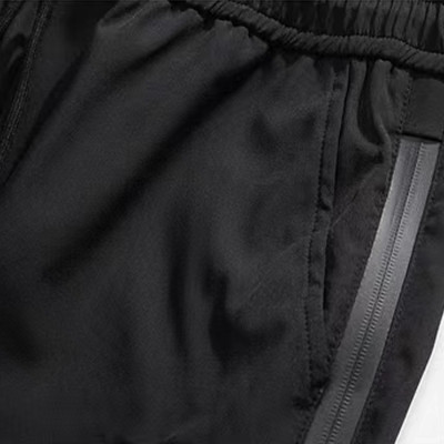 Custom men's drawstring elastic waistband printed side zipper nylon pants street style stretch sweatpants
