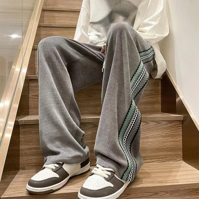 Custom men's drawstring elastic waist striped stitching sports pants street style stretch sports pants