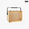 Altavoz de aspecto retro con malla de latón y cuero blanco