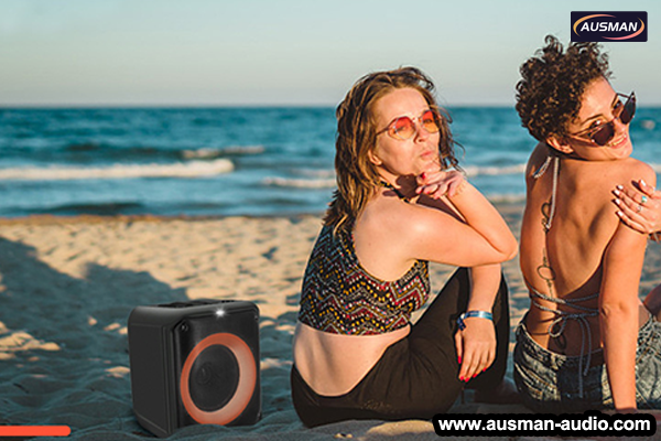 Beach vacation with portalbe speaker