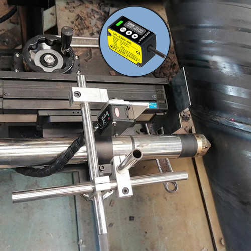 Auxiliary Equipment for Laser Pipe Cutting Machines in Cutting Spiral Welded Steel Pipes—Laser Displacement Sensors