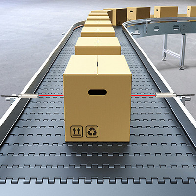 Photoelectric sensors detect boxed products on conveyor belts in factory automation environments.