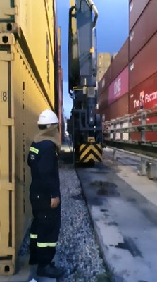 Port AGV operating in narrow container lane with safety LiDAR protection