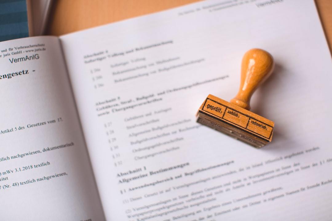 Rubber stamp on official German legal document - compliance marking process