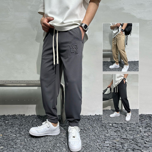 pantalons empilés personnalisés hommes avec prix d'usine de gaufrage | fournisseurs de vêtements en gros en Chine
