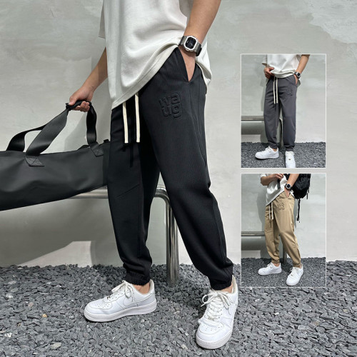 pantalons empilés personnalisés hommes avec prix d'usine de gaufrage | fournisseurs de vêtements en gros en Chine