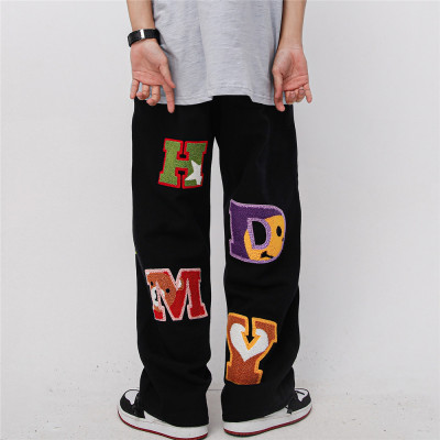 custom men stacked pants with chenille embroidery | garment factory in china