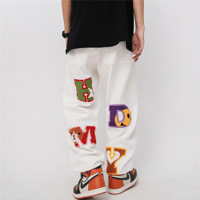 custom men stacked pants with chenille embroidery | garment factory in china