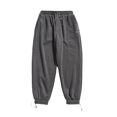 custom tapered pants mens with embossing  | china wholesale clothing suppliers