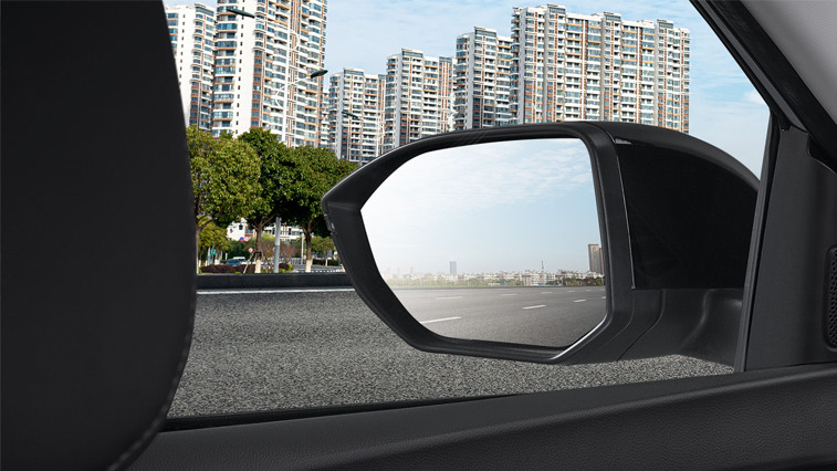 hat is a blind spot when driving a car on the road?