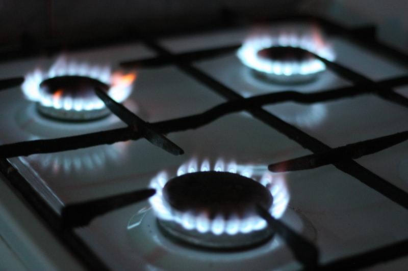 Commercial gas stove with cast iron grates and stainless steel body built for durability