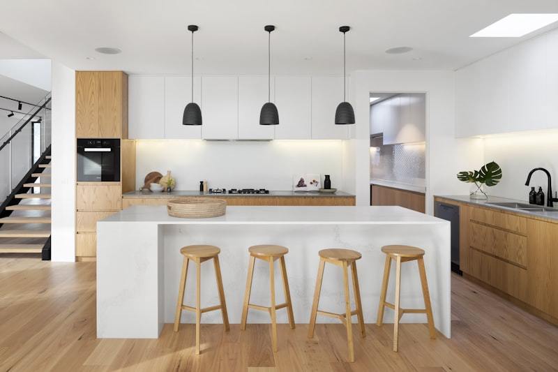 Multi-generational family using a gas and electric hob combined cooktop for weekend meal preparation