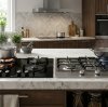 Gas-on-Glass vs Stainless Steel Cooktops: Which Is Better for Your Market?