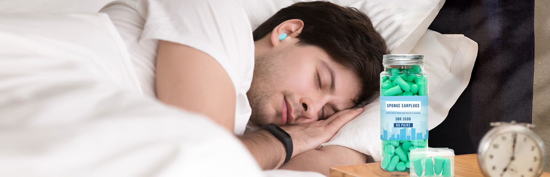 A man sleeping with earplugs