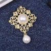 Natural freshwater pearl brooches A brooch