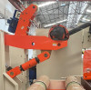 Revolucionando la máquina desenrolladora grande: presentamos el innovador dispositivo de brazo de soporte de material