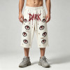 DTG Print Evil Eye Vintage Abrade Cropped Pants | Distressed Ripped Cut-Off Capri Pants | OEM Streetwear