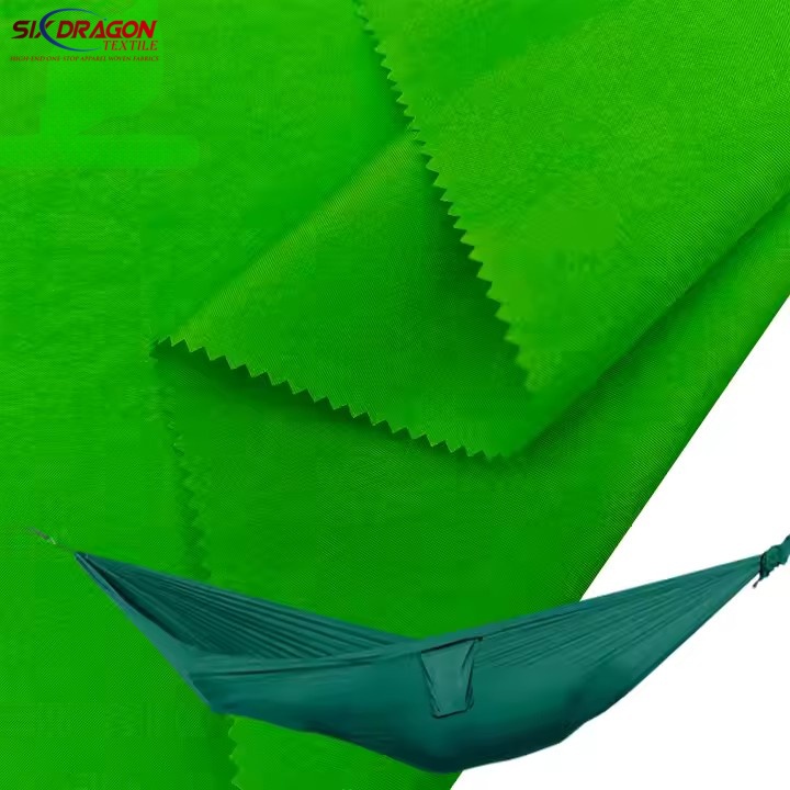 Dyed green polyester fabric